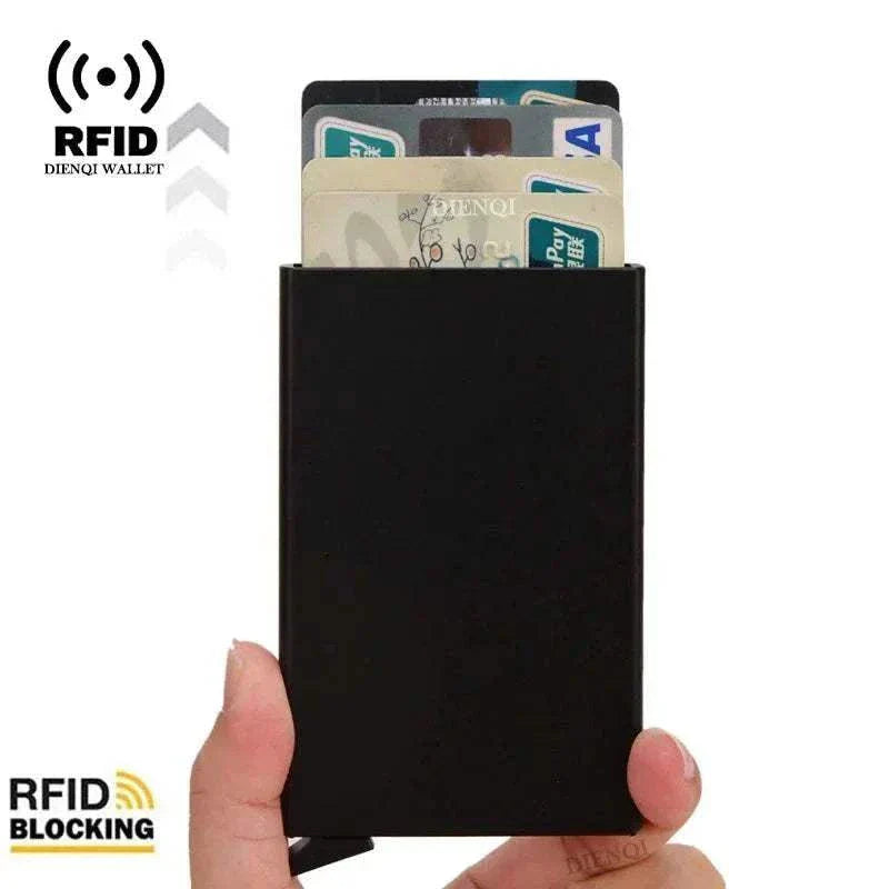 Slim black metal RFID credit card holder with pop-up function and minimalist design