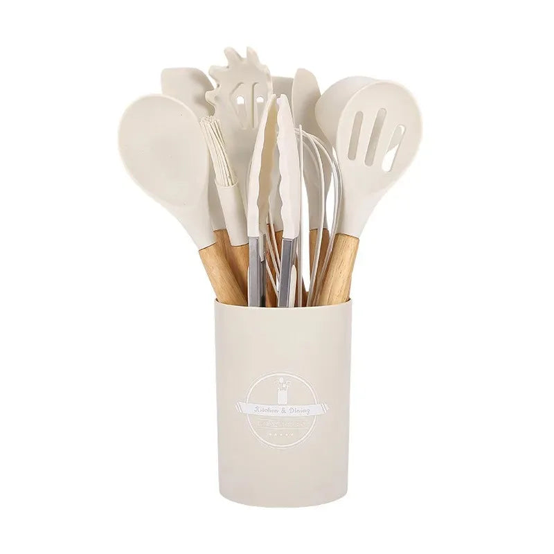 12-piece silicone kitchenware set with wooden handles, including spatulas, egg beaters, and cooking tools, heat-resistant and non-stick safe
